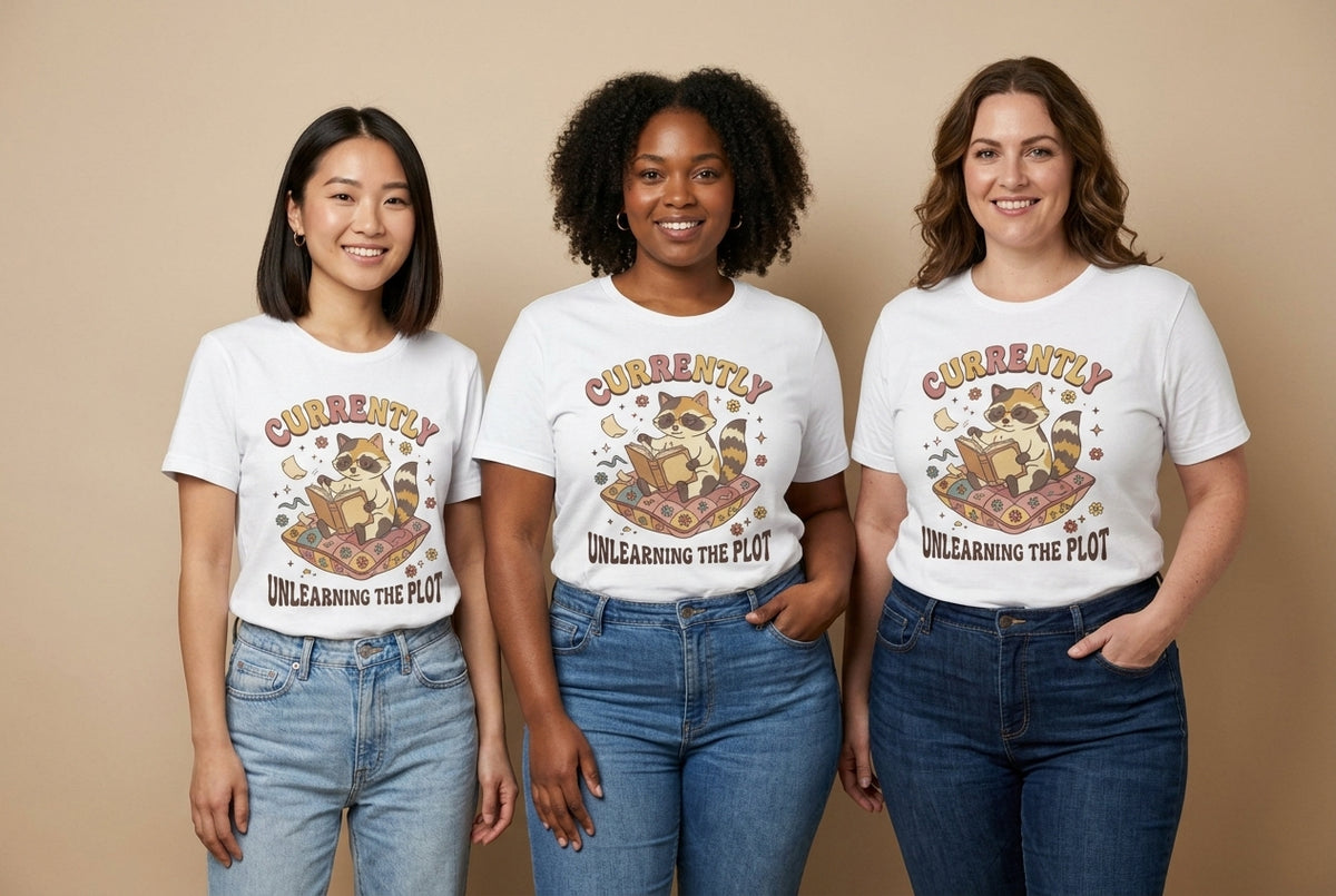 Cute Raccoon Reading Graphic Tee| Currently Unlearning the Plot