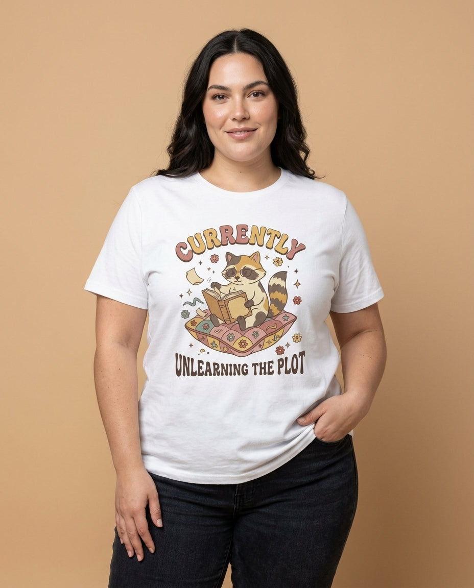 Cute Raccoon Reading Graphic Tee| Currently Unlearning the Plot